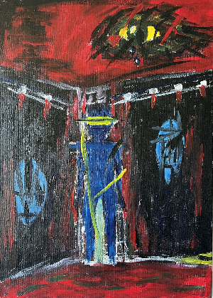 Мужчина стоит в углу