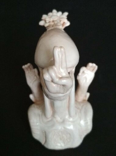 Улыбающийся Будда